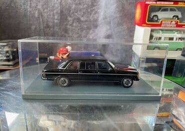 metbex tavan modelleri: Коллекционная модель Mercedes-Benz 240D V123 limousine black 1978 NEO — 12