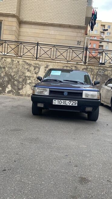 tofaş satış: Model: Tofas Şahin (sedan) Kuzov: 4 qapı, mavi rəng Yanacaq: Benzin — 9