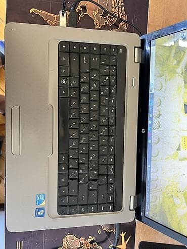 korpus hp: HP G62 noutbuk - Ekran: 15.6" HD (matris parlaq), yuxarıda inteqrə — 2