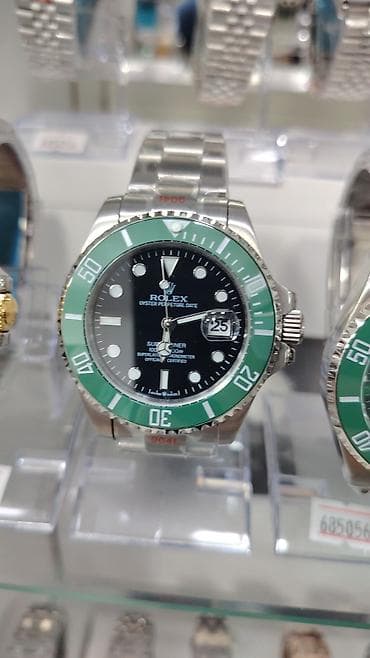 bil: Rolex saat kolleksiyası – vitrində təqdim olunan modellər: - Rolex — 5
