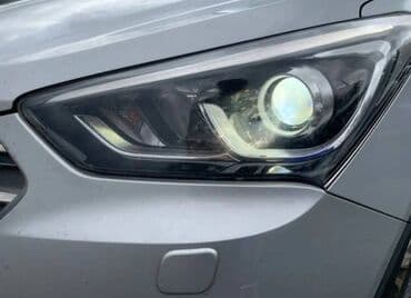 hundur masin: Hyundai Santa Fe – gümüşü rəngdə, geniş və rahat SUV. Əsas — 10