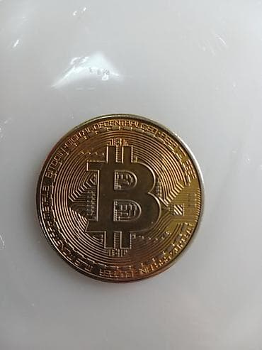 Məhsul: Bitcoin temalı kolleksiya sikkəsi Təsvir: - Ön üz: Ortasında