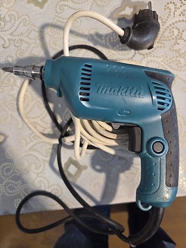drel makita: Makita 6413 elektrikli drel. Model: **Makita 6413** Patron ölçüsü — 1
