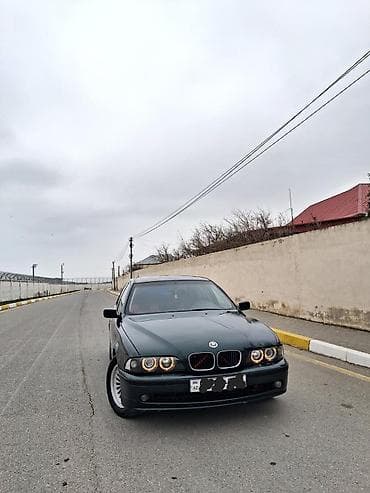 disqi teker mersedes: BMW 5 series: 2.8 l | 1997 il Sedan — 1