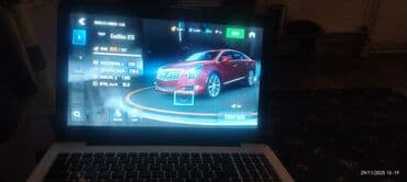 Elektron kitablar: ASUS noutbuk - Korpus: gümüş rəngli, ASUS loqolu qapaq - Ekran — 3