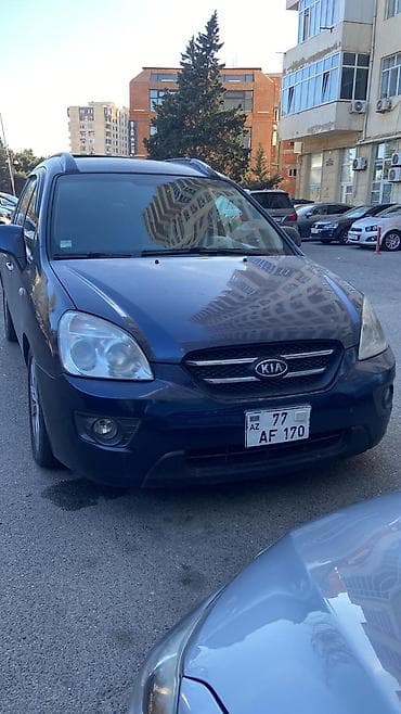 Aksesuarlar və tüninq: Kia Carens CRDi – dizel, avtomat - Kuzov: tünd mavi, 5 qapı — 7