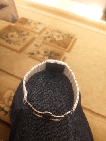 Muncuqlar: RADO Jubile kişi/qadın qol saatı – ağ keramik korpus və bilərzik - — 2