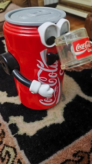 Сувенир куплен в Атланте в 1996 году.
В музее Coca cola — 2