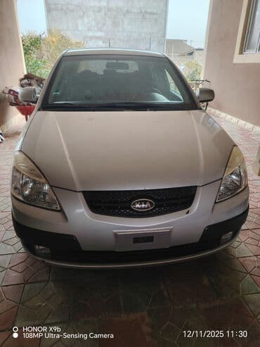 автомобиль фольксваген поло: Kia Rio: 1.4 л | 2006 г. Хэтчбэк — 4