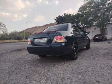 loreva диффузор: Mitsubishi sedan salonu – geniş və funksional interyer - Avtomatik — 12