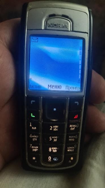Nokia < 2 GB Memory Capacity, rəng - Gümüşü, Düyməli — 1