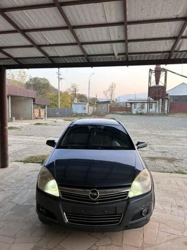 qadınlar ucun maşınlar: Opel Astra: 1.3 l | 2007 il 385700 km Universal — 1