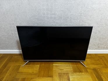 LED televizor, təxmini 50–55 düym ekran - Nazik çərçivə və metal