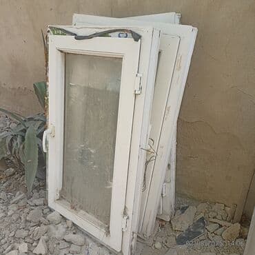 islenmis pencereler: Bu, ağ rəngdə PVC materialdan hazırlanmış pəncərədir. Pəncərənin — 1
