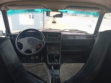 qapı bağlayan: VAZ 2107, qırmızı rəng, 4 qapılı sedan. Texniki və xarici — 7