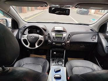 kia caren 2012: Hyundai ix35: 2 l | 2011 il Krossover — 9