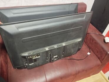 Информатика: LED televizor - Ekran: 1.07 çərçivəli düz panel - Rəng: qara - Ön — 1