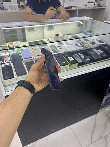 telefonl: Samsung Galaxy A15, rəng - Bənövşəyi, Barmaq izi — 2