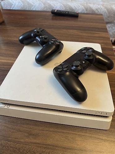 dualshok 4: Məhsul: Sony PlayStation 4 Slim (ağ rəng) Tərkib: - Konsol: PS4 Slim — 1
