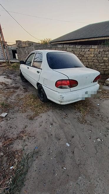 bmw e46 lip: Kia Avella: 1.3 l | 1997 il Hetçbek — 2