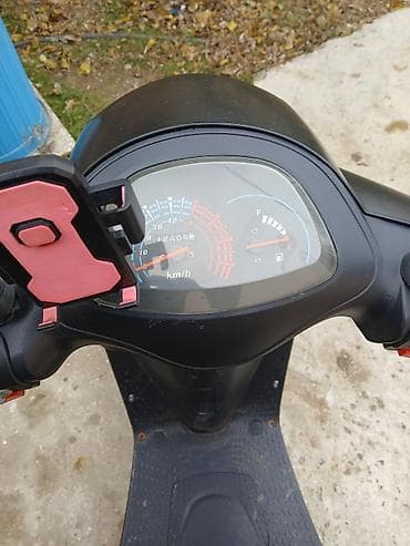 teker lada: Şəhər içi hərəkət üçün kompakt skuter - Rəng: mat qara - Korpus — 1