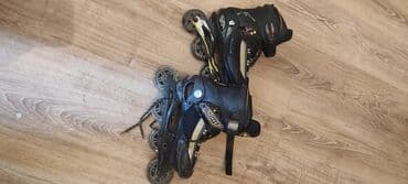 сколько стоит ролики: Dörd təkərli, qara rəngli uniseks roliklər. Hər rolikdə dörd təkər — 1