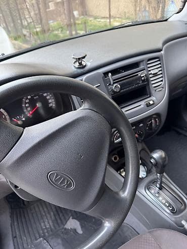 kia rio masin: Kia Rio: 1.4 l | 2010 il Sedan — 6