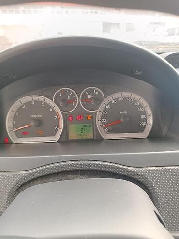 Chevrolet: Chevrolet Aveo sedan - Kuzov: 4 qapılı sedan, boz (metallik) rəng - — 5