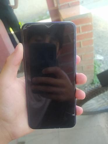 mikro qulaq: Redmi 9 əla vəziyətdədir usdundəki Qoruycudu ekram sınığı yoxdur — 2