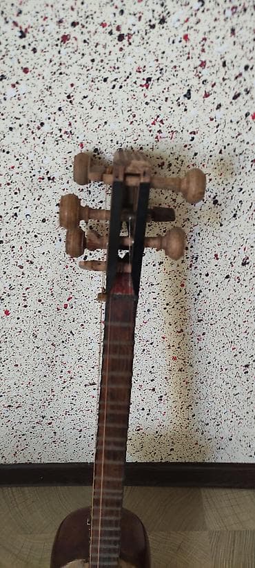 gitara klasik: Məhsul: Tar (xalq simli musiqi aləti).Evde usaqindir illərin — 7