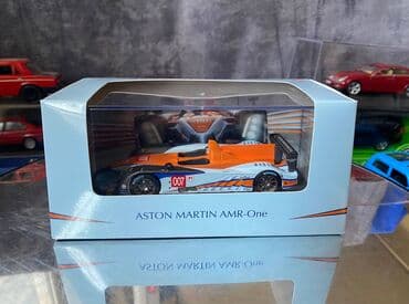 где можно продать марки: Коллекционная модель Aston Martin AMR-One #7 Gulf Team LeMans 2011 — 1