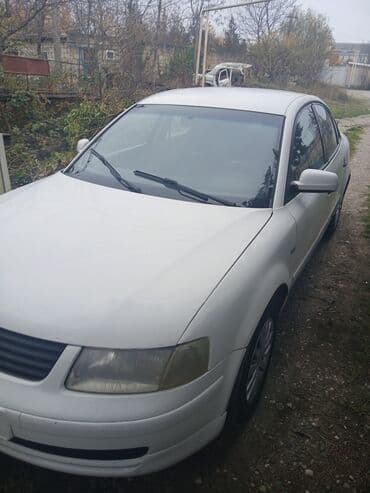 запчасти форд мондео 3: Ağ rəngli sedan, 4 qapı, ön‑sürüşlü. Korpusda zavod aerodinamik — 1