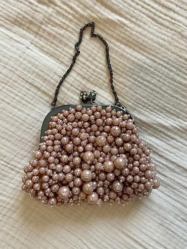 Əl çantası, İşlənmiş