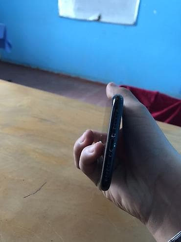 iphone 15 pro max islenmis: IPhone 7, 128 GB, Qara, Barmaq izi — 4