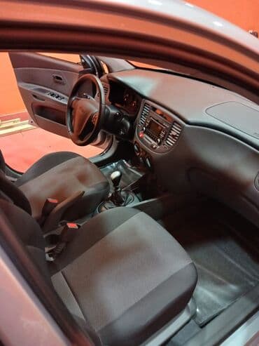 chevrolet cruze salon qiymeti: Kia Rio hatchback - Kuzov: 5 qapılı hatchback, gümüşü rəng - Mühərrik — 3