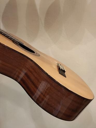 qədimi pullar: Klassik gitara
Model:Kapok SC168
Üst:Şam ağacı
Çanta hədiyyə
Ölçü:4/4 — 2