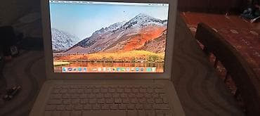 ucuz apple telefon: Apple MacBook (ağ unibody, plastik korpus) - Ekran: 13.3" (LED) — 3