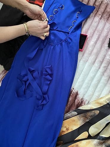 Paltolar: Arxasi iple baglanir hec geyinilmeyib razmer 40 strec 42 gedir — 1