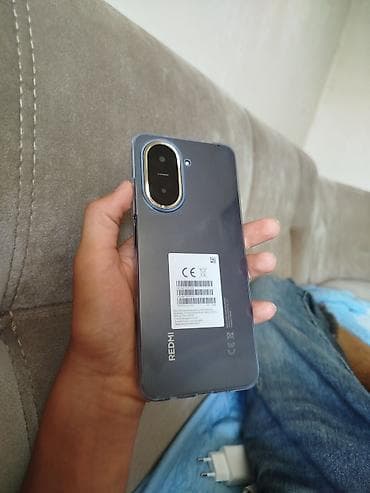 17 dubay: Redmi A5, 128 GB, rəng - Qara, Barmaq izi, İki sim kartlı — 2
