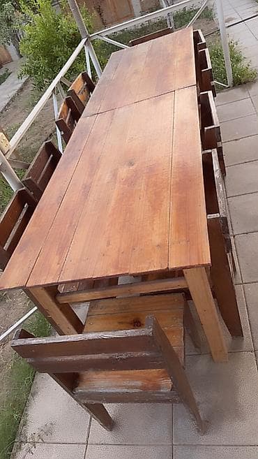bag stullari: Tecili satilir. Taxta lakli. Uzun 10 neferlik masa. 10 oturacaq. Bu — 2