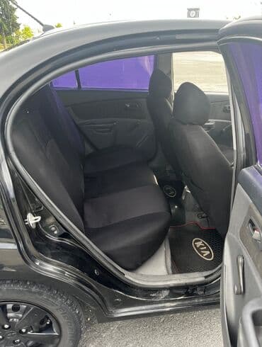 авто подлокотники: Kia Rio: 1.4 л | 2008 г. Седан — 4