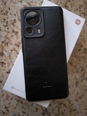 xiaomi note 10 lite: Xiaomi 13 Lite, 256 GB, rəng - Qara, 
 Sensor, Simsiz şarj, İki sim kartlı — 5