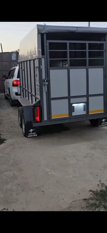 lapetler: Heyvan daşıma qoşqusu (treyler) - İki oxlu, avtomobilə qoşulan heyvan — 2