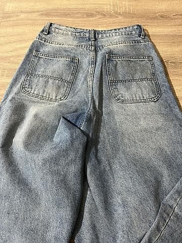 şalvarlar: Geniş kəsimli, daş yuyulmuş effektli mavi džins şalvar. - MateriaI — 3