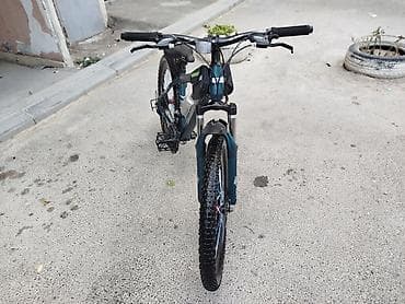 velosiped ural: Dağ velosipedi – 24” təkərlər, enli protektorlu şinlər. Rəng: tünd — 7