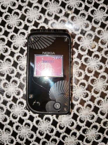 сотовый телефон fly fs458: Nokia 7610, < 2 ГБ, цвет - Черный, Кнопочный — 1