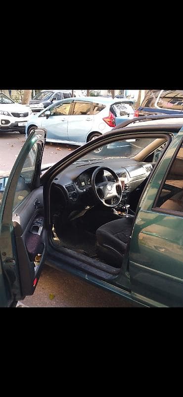 Volkswagen City Golf: 2 л | 2001 г. Универсал — 6