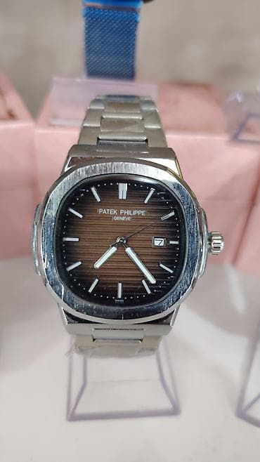 elektrikli saat: Patek Philippe tərzində analoq qol saatları – klassik Nautilus dizaynı — 4