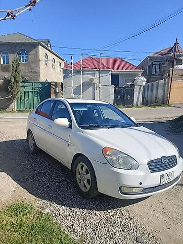 kia clarus 1997: Hyundai Accent: 1.6 l | 2009 il Sedan — 2