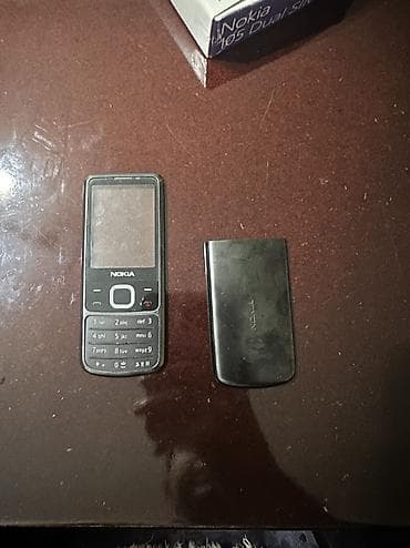 acer betouch e400: Nokia 6700 Slide — 2